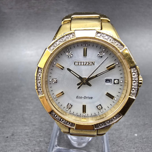 Citizen Eco-Drive Watch Women 30mm Silver Dial Gold Tone Date E013-S111676 Runs0