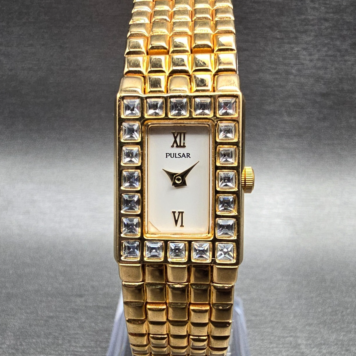 Seiko Pulsar Watch Women 17mm White Dial Gold Tone Gemmed V810-X064 New Battery0