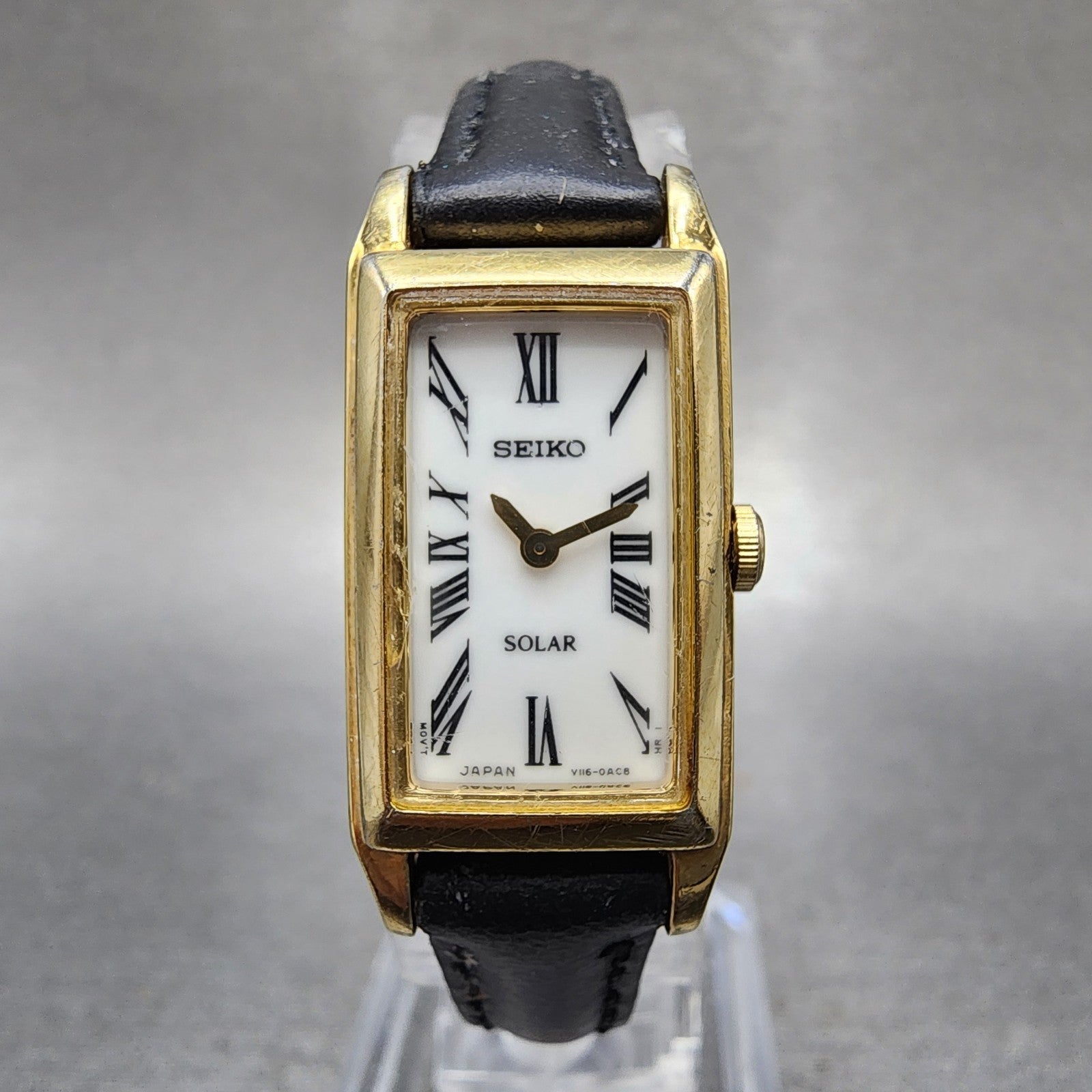 Seiko Solar Tank Watch Women 15mm White Dial Gold Tone Rectangle V1160AA0 Works0