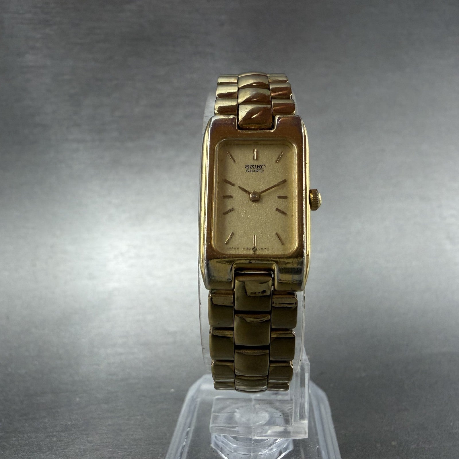 Seiko Tank Watch Women 15mm Champagne Dial Gold Tone Rectangle 1F20-5D99 New Bat5
