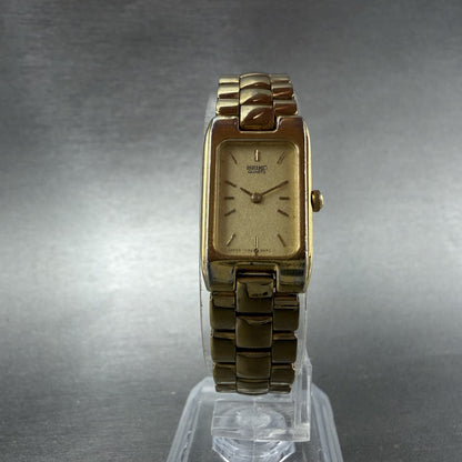 Seiko Tank Watch Women 15mm Champagne Dial Gold Tone Rectangle 1F20-5D99 New Bat5