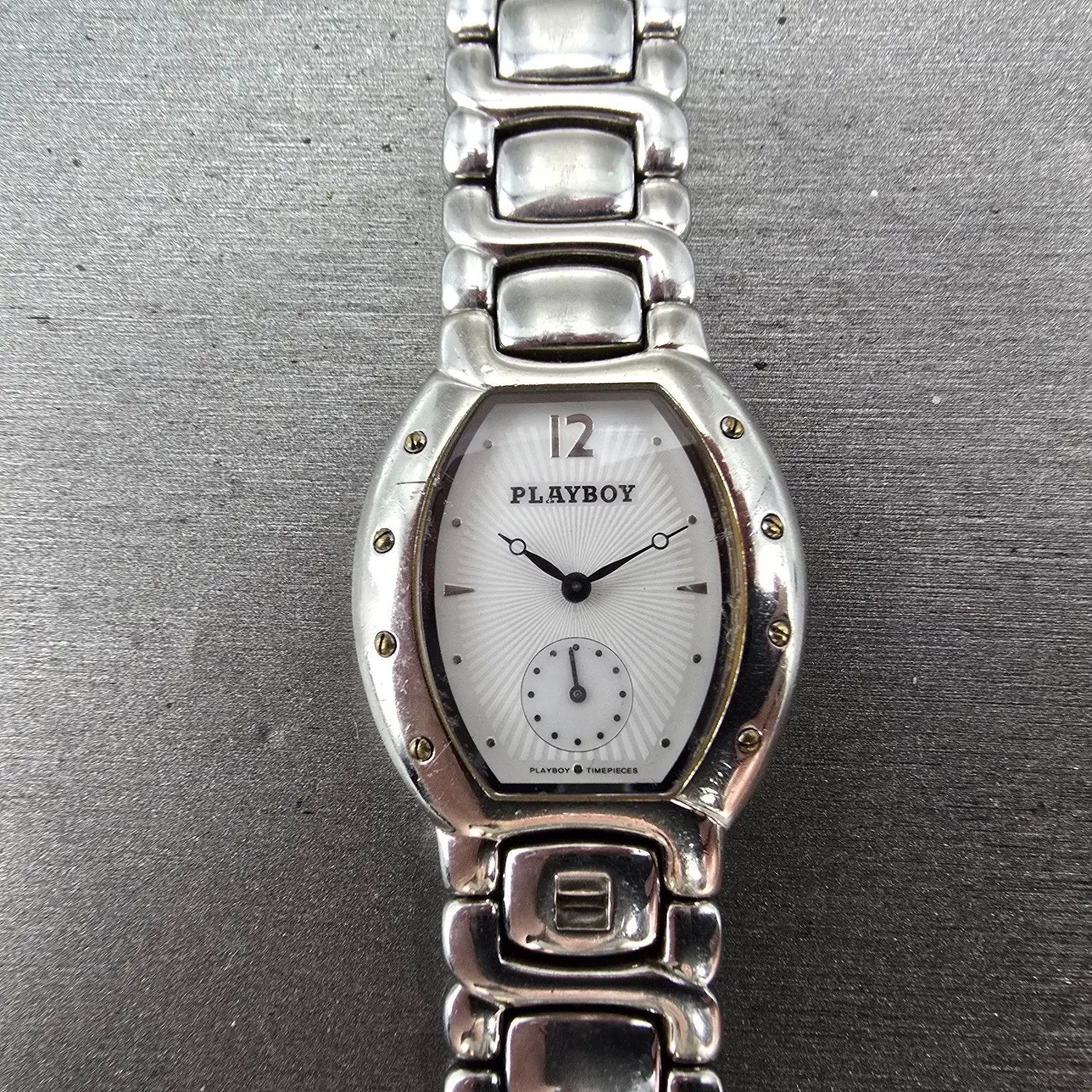 Playboy Watch Men 29mm White Dial Silver Tone Oval New battery MISSING CLASP!!!0