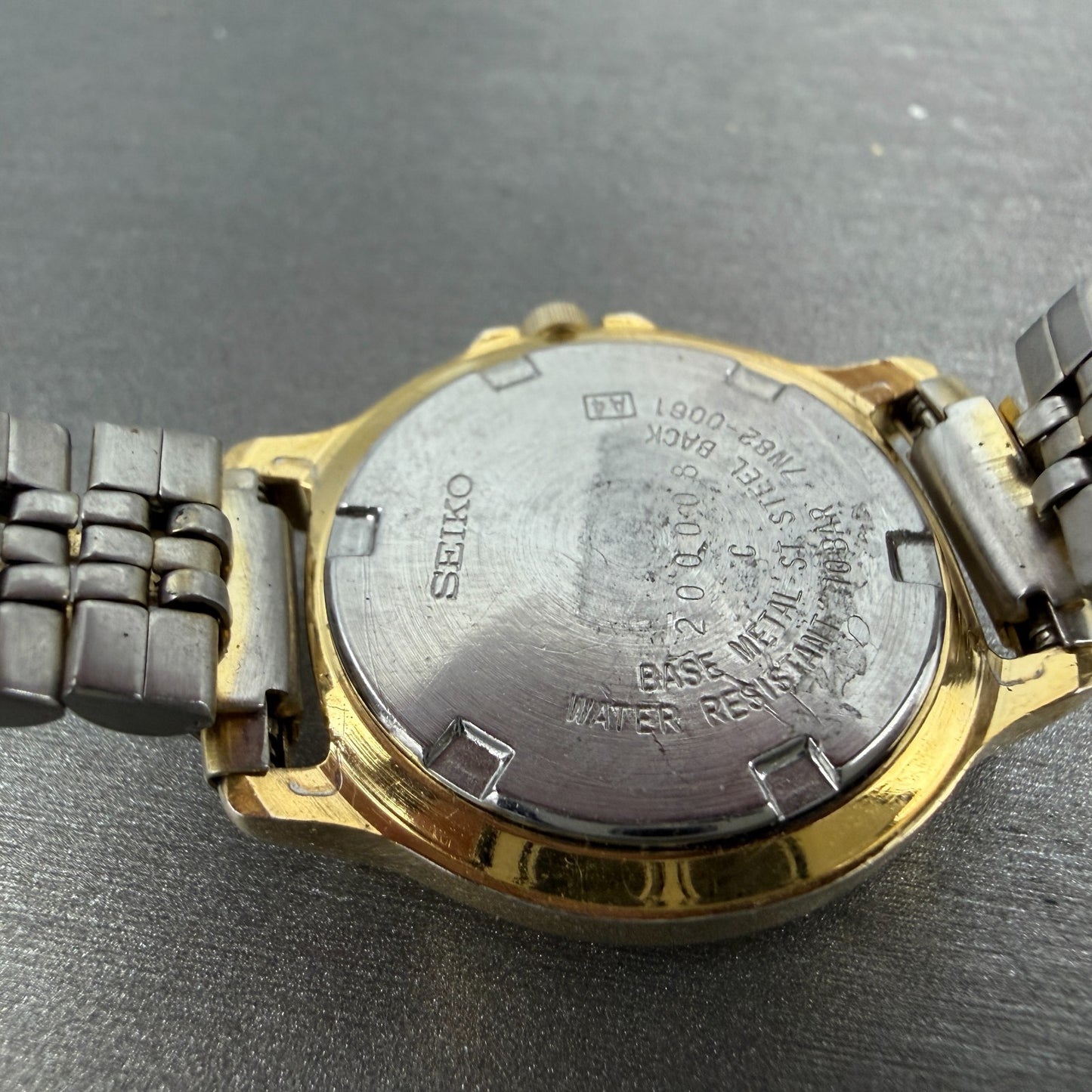 Seiko SQ 100 Watch Women 28mm White Dial Gold Tone Date 7N82-0061 New Battery9