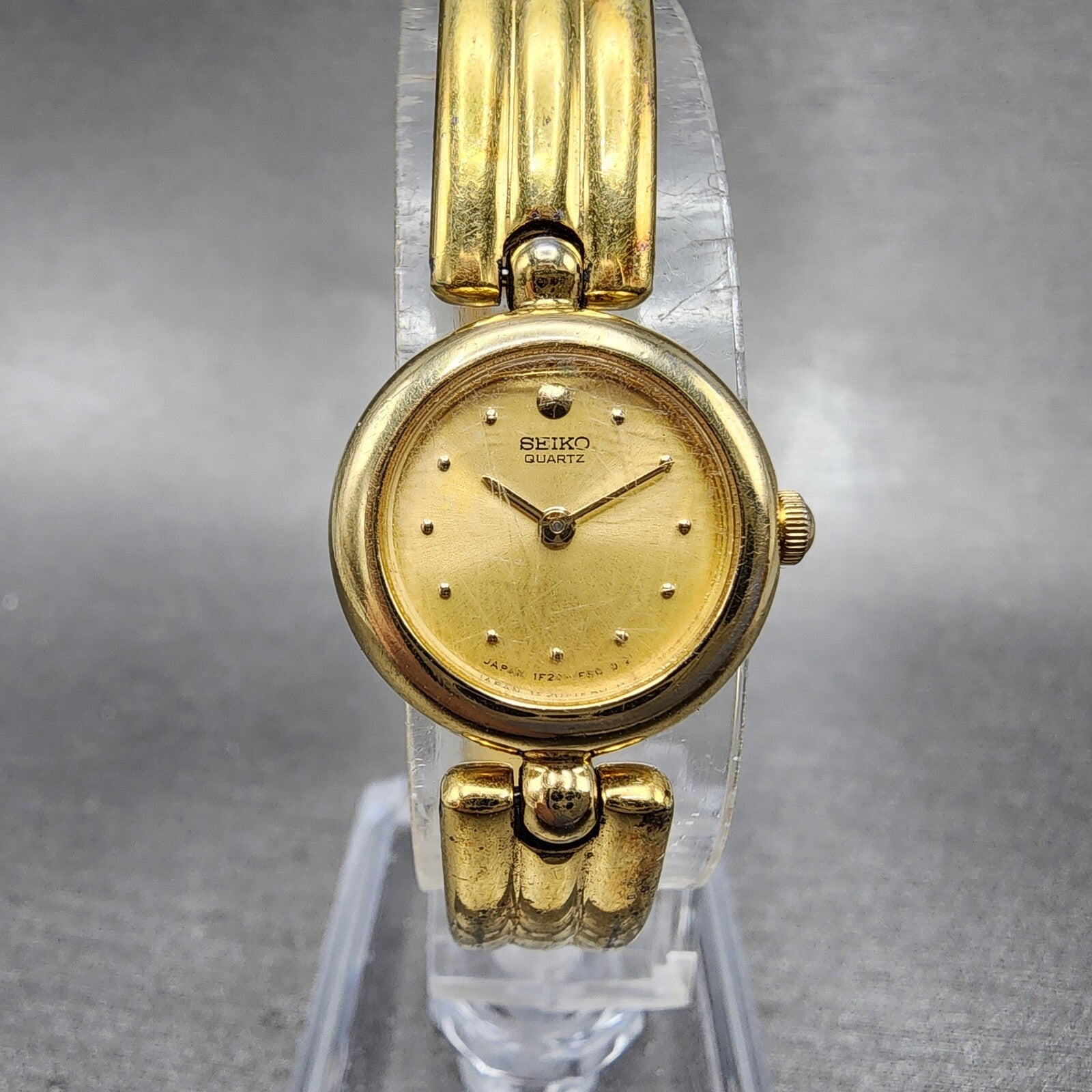 Seiko Watch Women 18mm Gold Dial Gold Tone Round Bangle 1F200E89 New Battery0