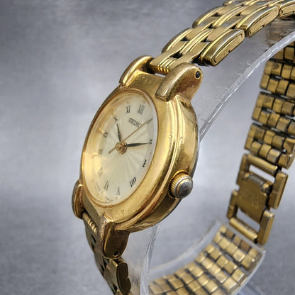 Seiko Watch Women 24mm Champagne Dial Gold Tone Round V7011781 New Battery VTG2