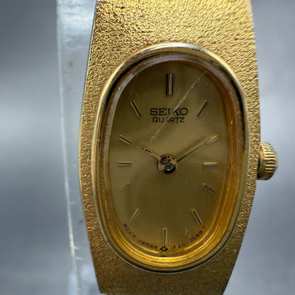 Seiko Watch Women 14mm Champagne Dial Gold Tone Oval 1F20-5C90 New Battery VTG1