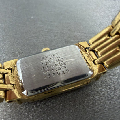 Seiko Tank Watch Women 14mm Champagne Dial Gold Tone 2E207191 New Battery9