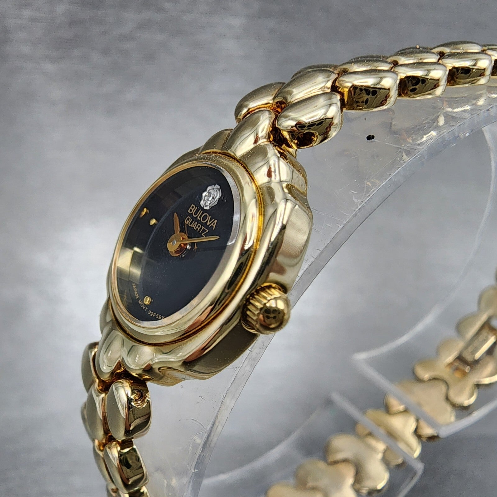 Bulova Watch Women 17mm Black Dial Gold Tone Round 92F59 New Batt NOS4