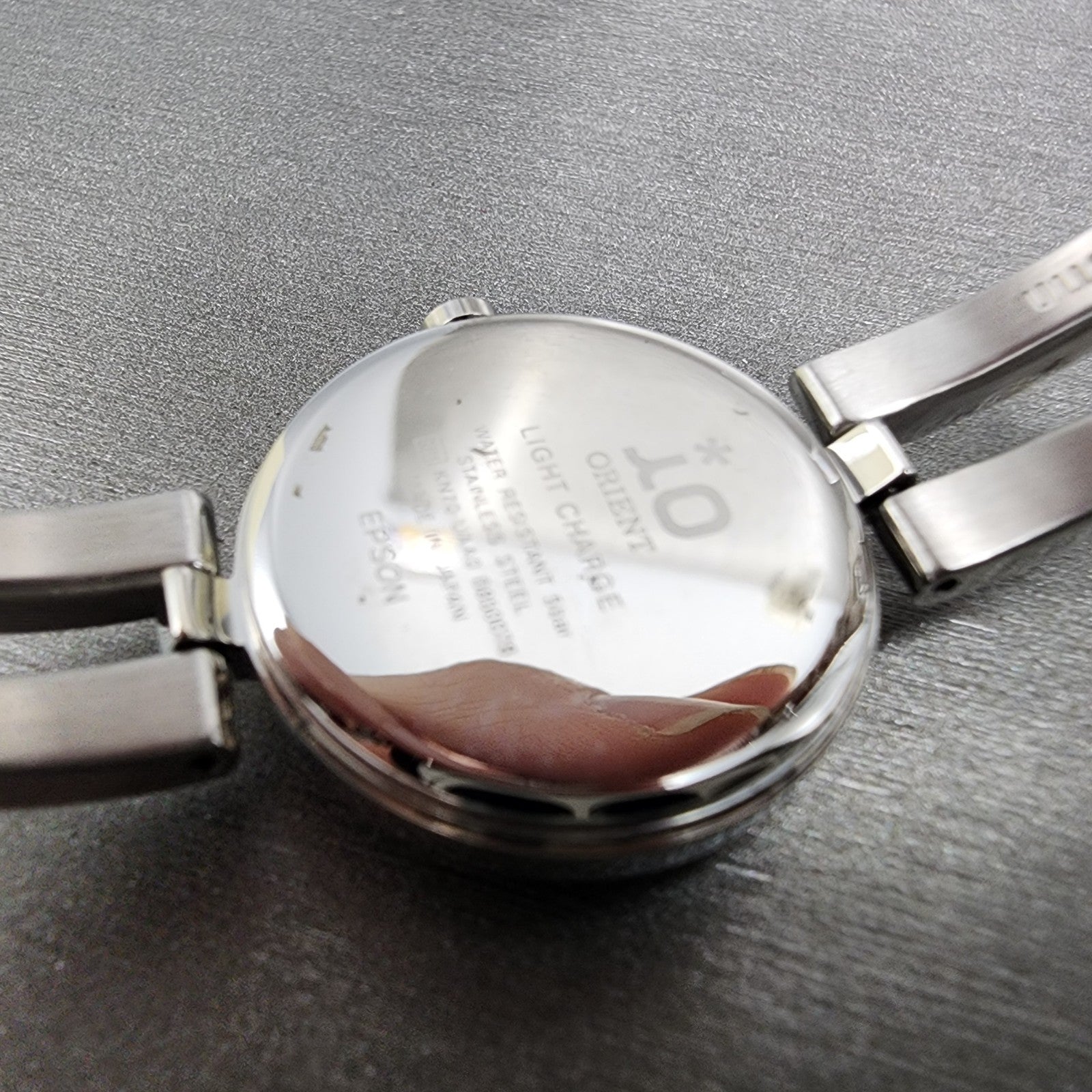 Orient IO Solar Watch Women 24mm MOP Dial Silver Tone Date Round KN70UAA0 Runs10