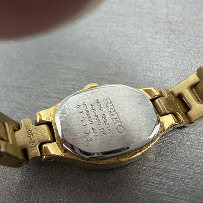 Seiko Watch Women 17mm Champagne Dial Gold Tone Oval 1N01-0CS0 New Battery9