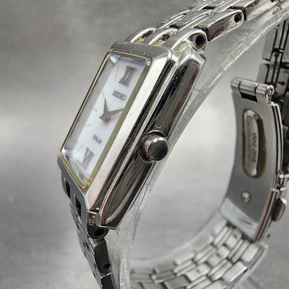 Seiko Solar Tank Watch Women 18mm White Dial Steel Rectangle V114-0AC0 Runs