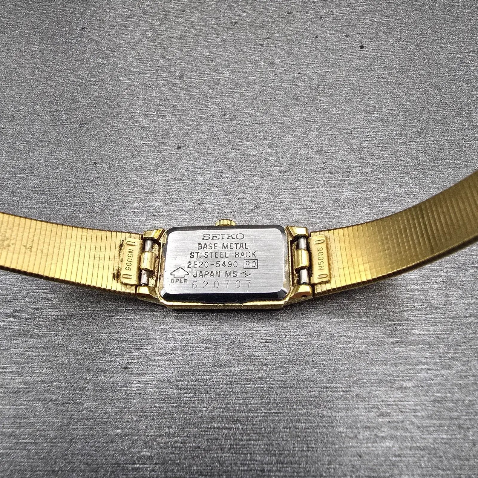 Seiko Tank Watch Women 12mm Black Dial Gold Tone Rectangle 2E20-5490 New Battery10