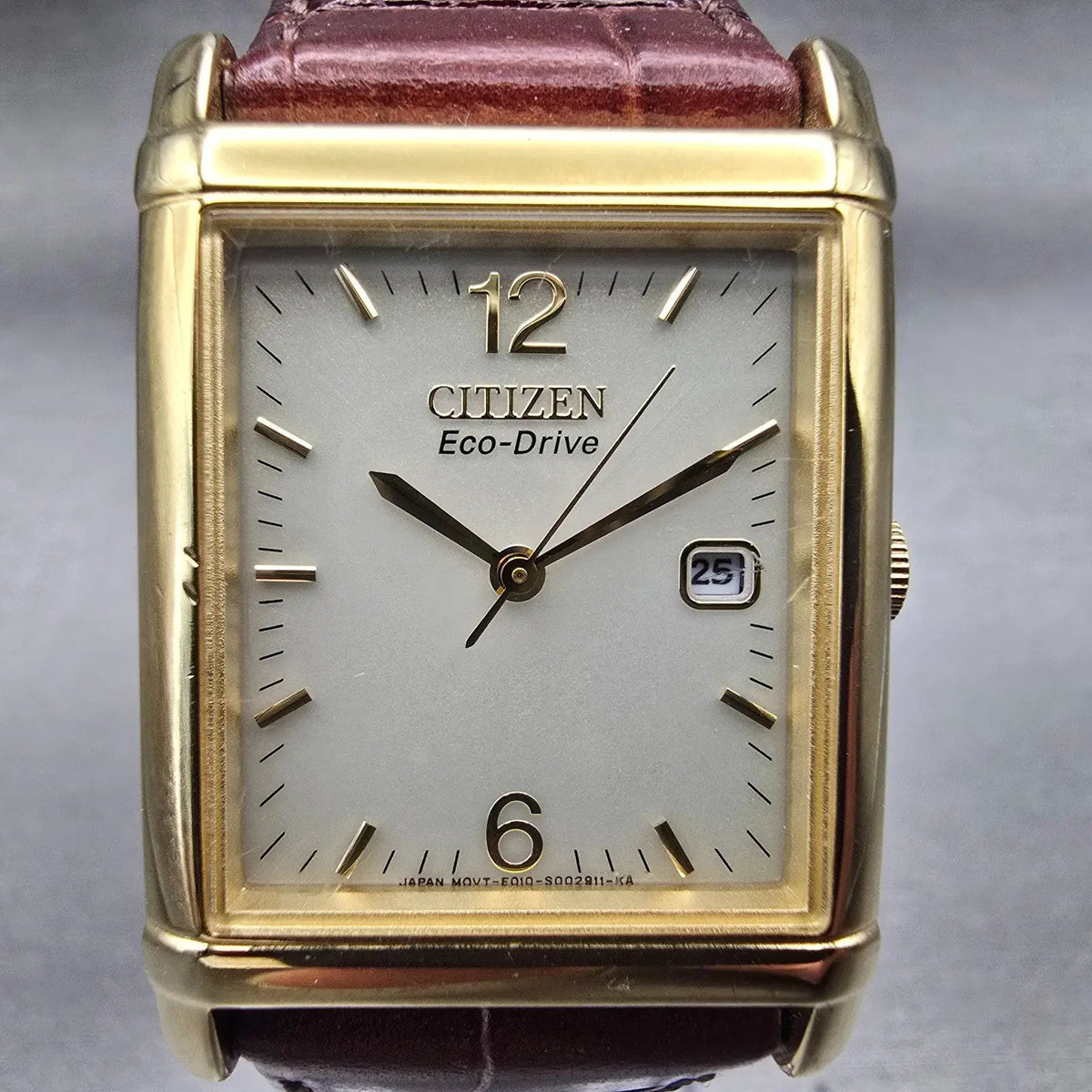 Citizen Eco-Drive Tank Watch Men 25mm Ivory Dial Gold Date E010-S001579 Works1