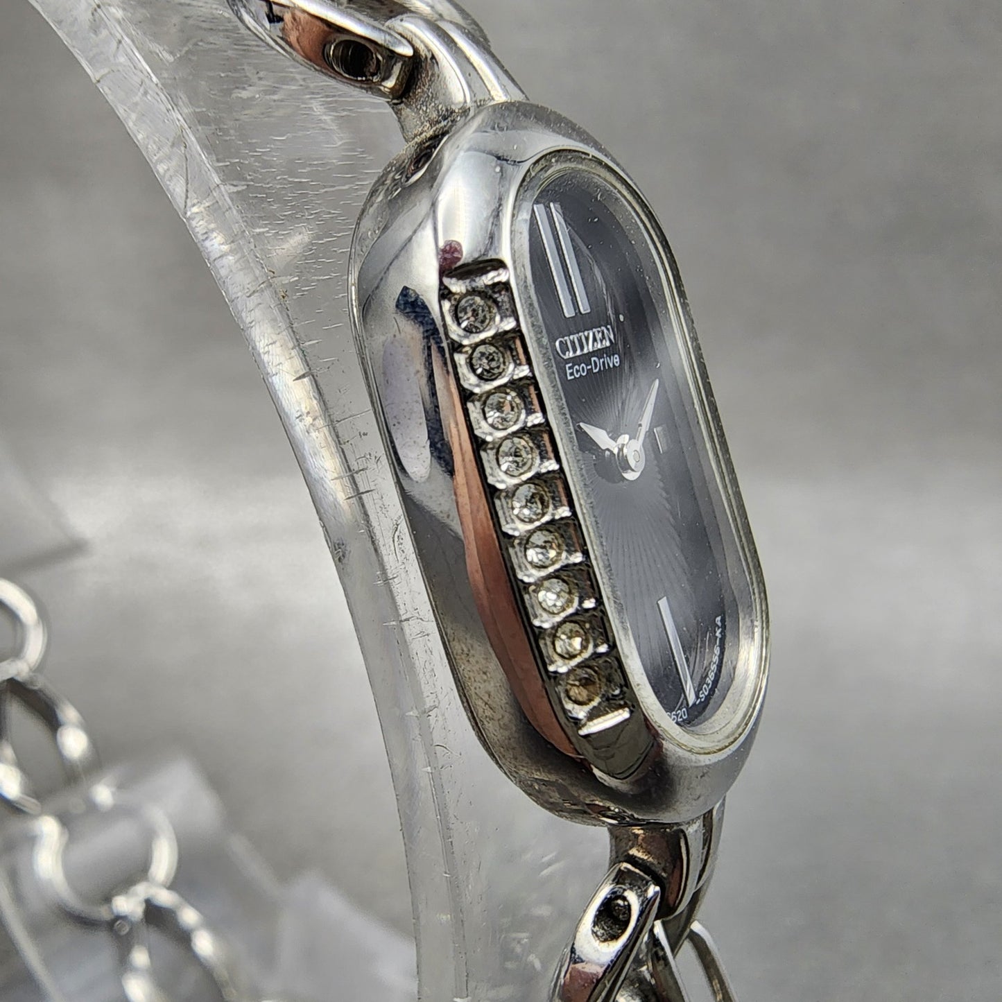 Citizen EcoDrive Watch Women 14mm Black Dial Silver Tone Oval Crystal Bezel3