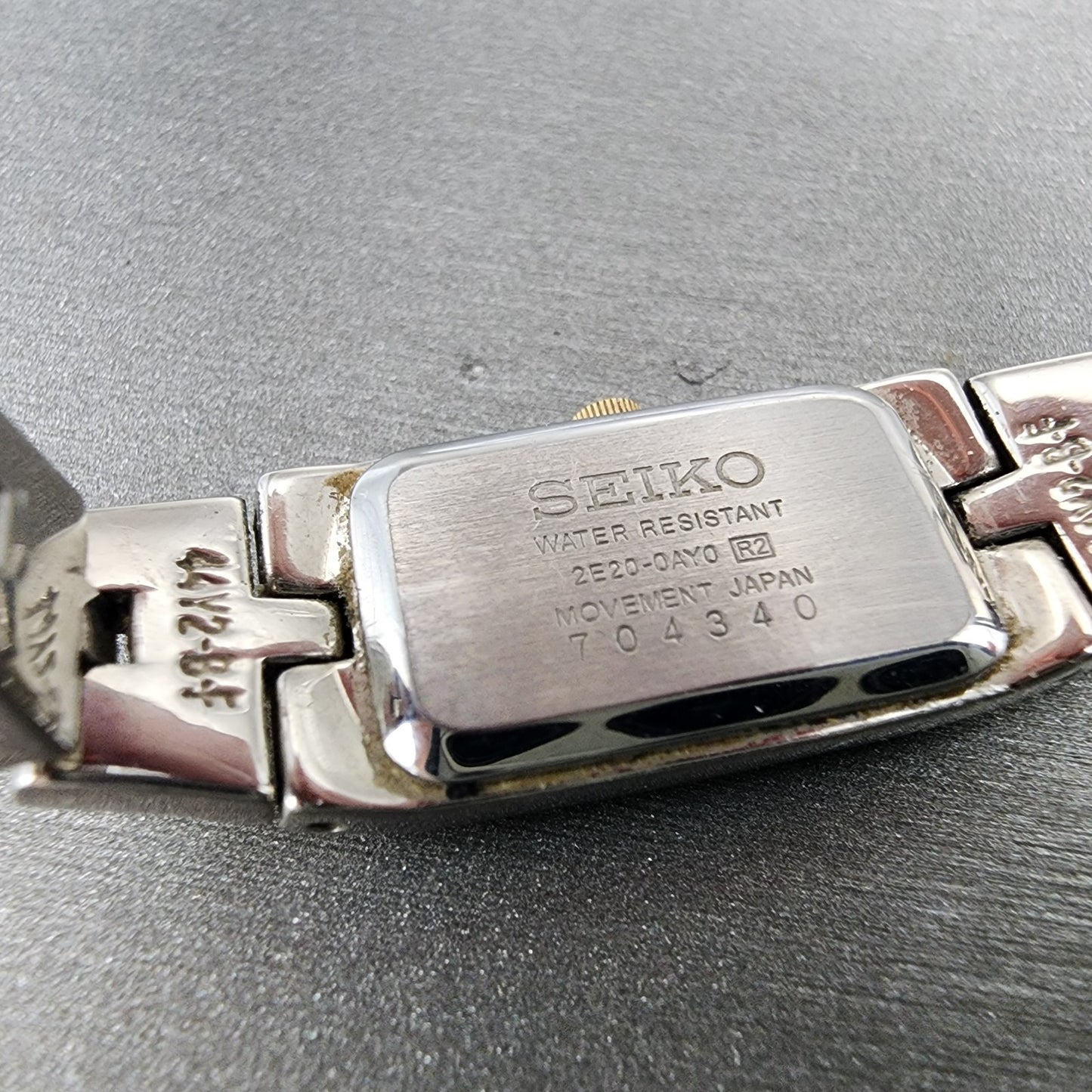 Seiko Tank Watch Women 13mm White Dial two Tone Rectangle 2E200AY0 New Battery9