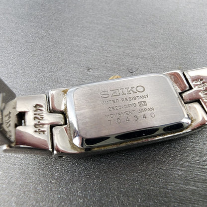 Seiko Tank Watch Women 13mm White Dial two Tone Rectangle 2E200AY0 New Battery9