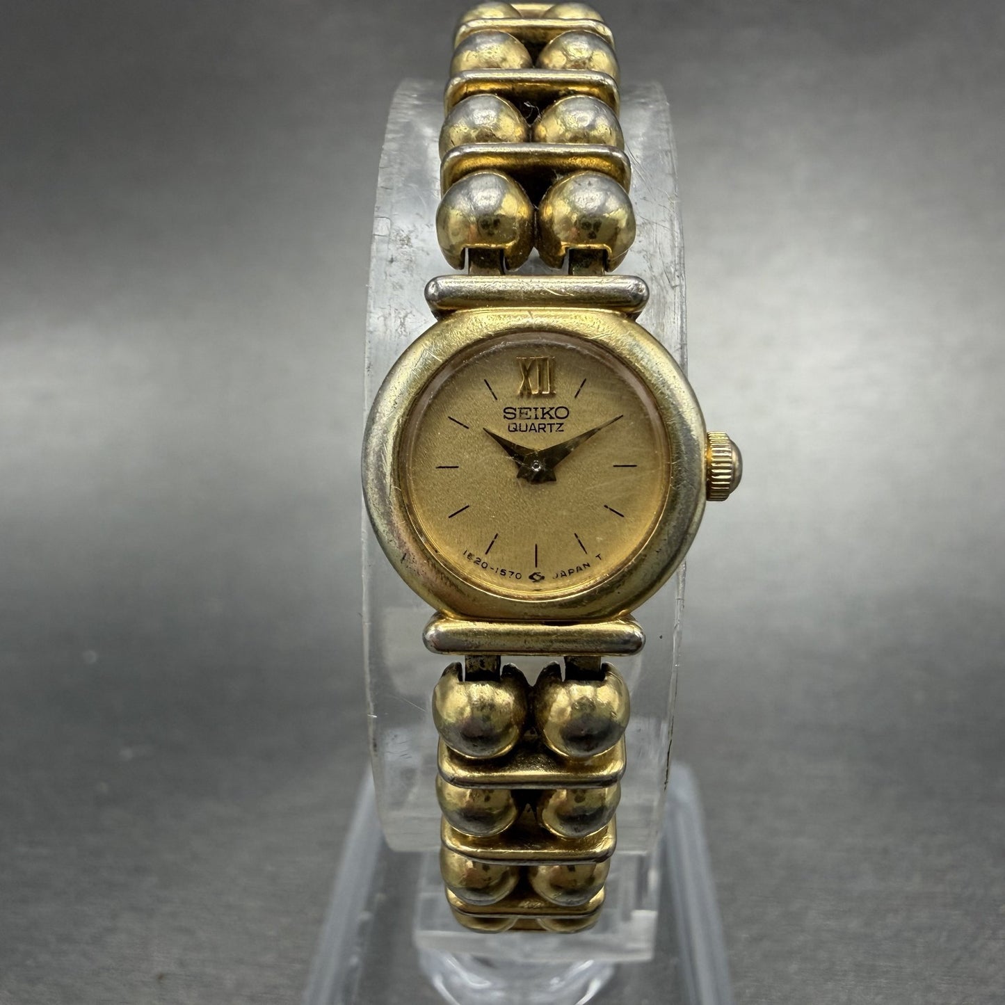 Seiko Watch Women 15mm Champagne Dial Gold Tone Round 1E20-0449 New Battery0