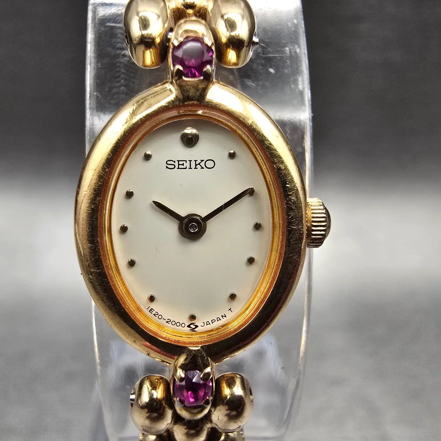 Seiko Watch Women 13mm Ivory Dial Gold Tone Gemmed Oval 1E20-6140 New Battery1