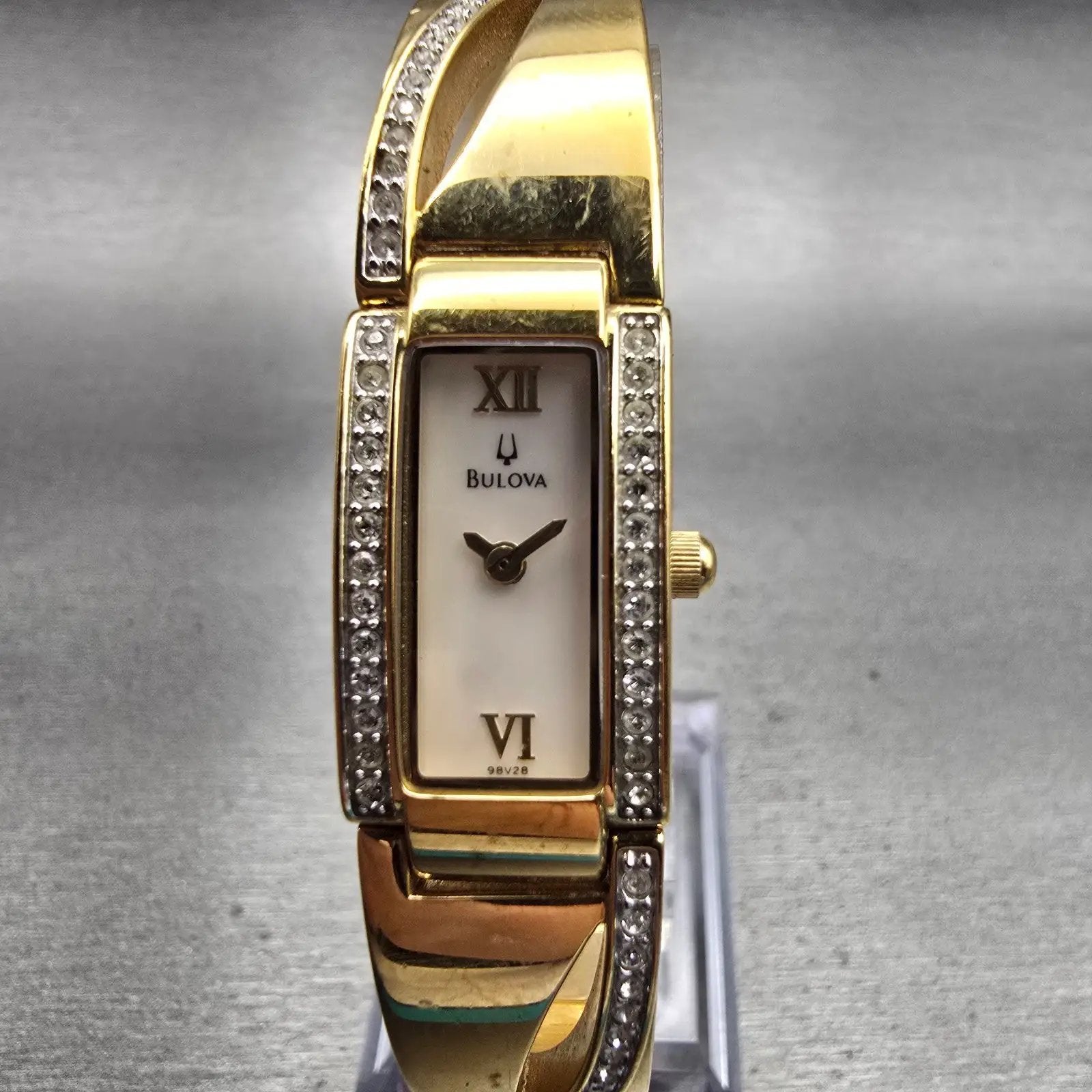 Bulova Watch Women 14mm MOP Dial Gold Tone Gemmed Rectangle 98V28 New Battery0