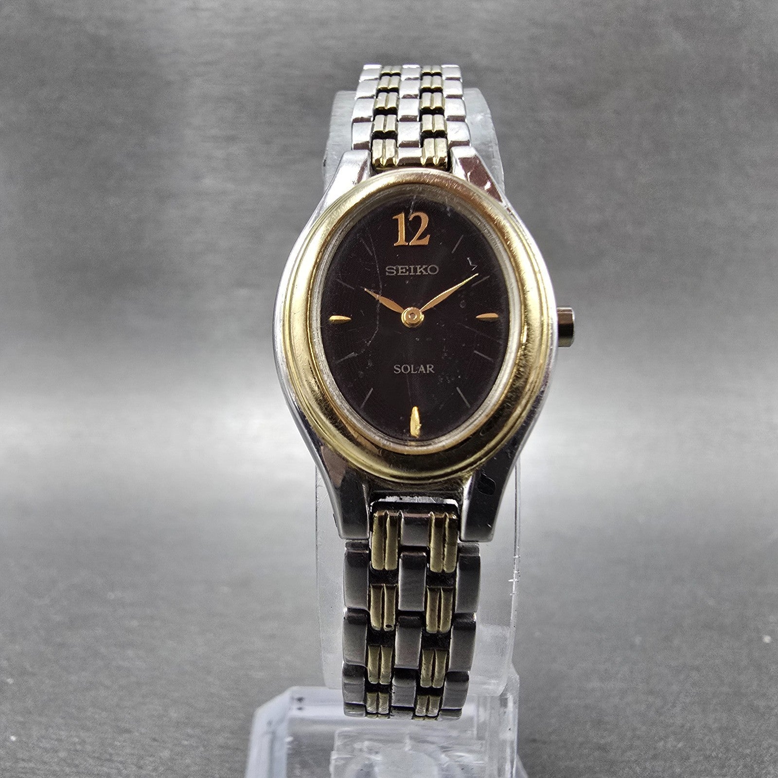 Seiko Solar Watch Women 20mm Black Dial Two Tone Oval V114-0AA0 Runs5