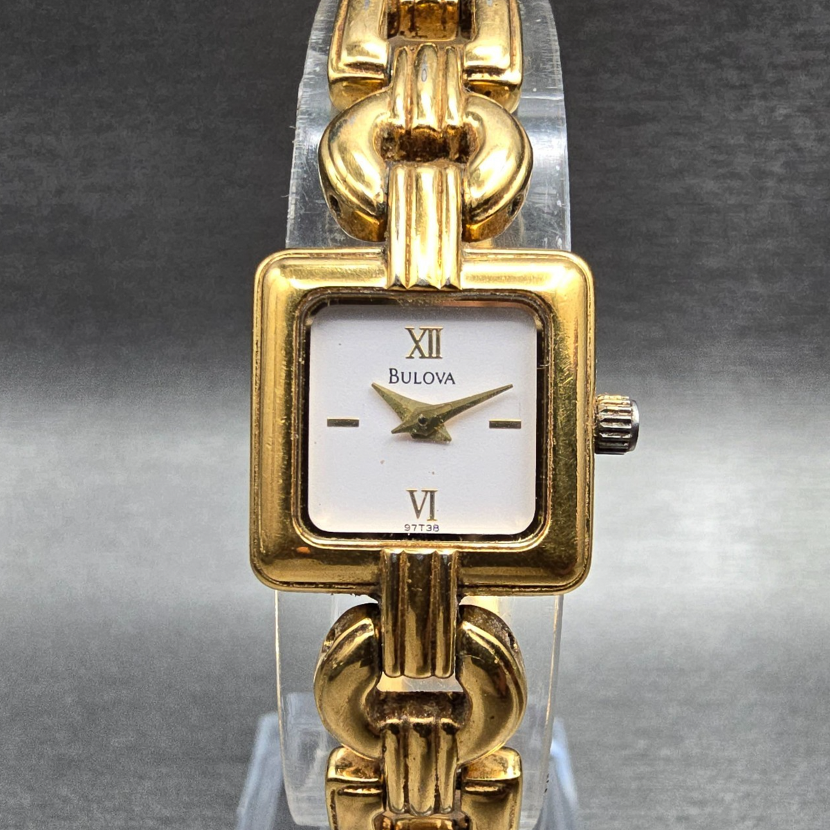 Bulova Watch Women 17mm White Dial Gold Tone Square 97T38 New Battery0
