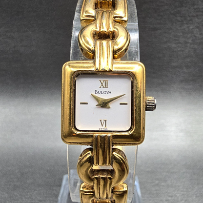 Bulova Watch Women 17mm White Dial Gold Tone Square 97T38 New Battery0
