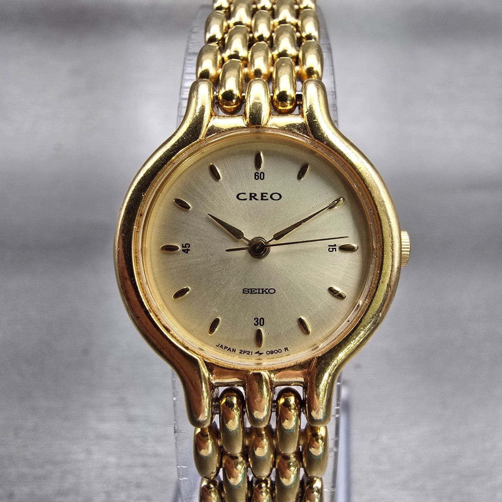 Seiko Creo Watch Women 22mm Champagne Dial Gold Tone Round 2P21-0250 New Battery0