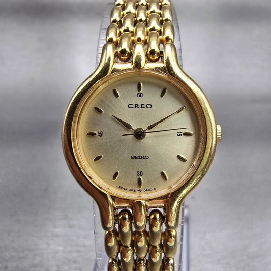 Seiko Creo Watch Women 22mm Champagne Dial Gold Tone Round 2P21-0250 New Battery0