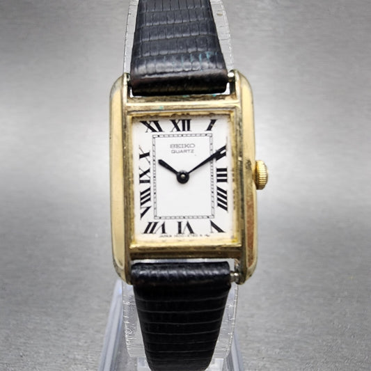 Seiko Tank Watch Women 17mm White Dial Gold Tone Rectangle 1400-8069 New Battery