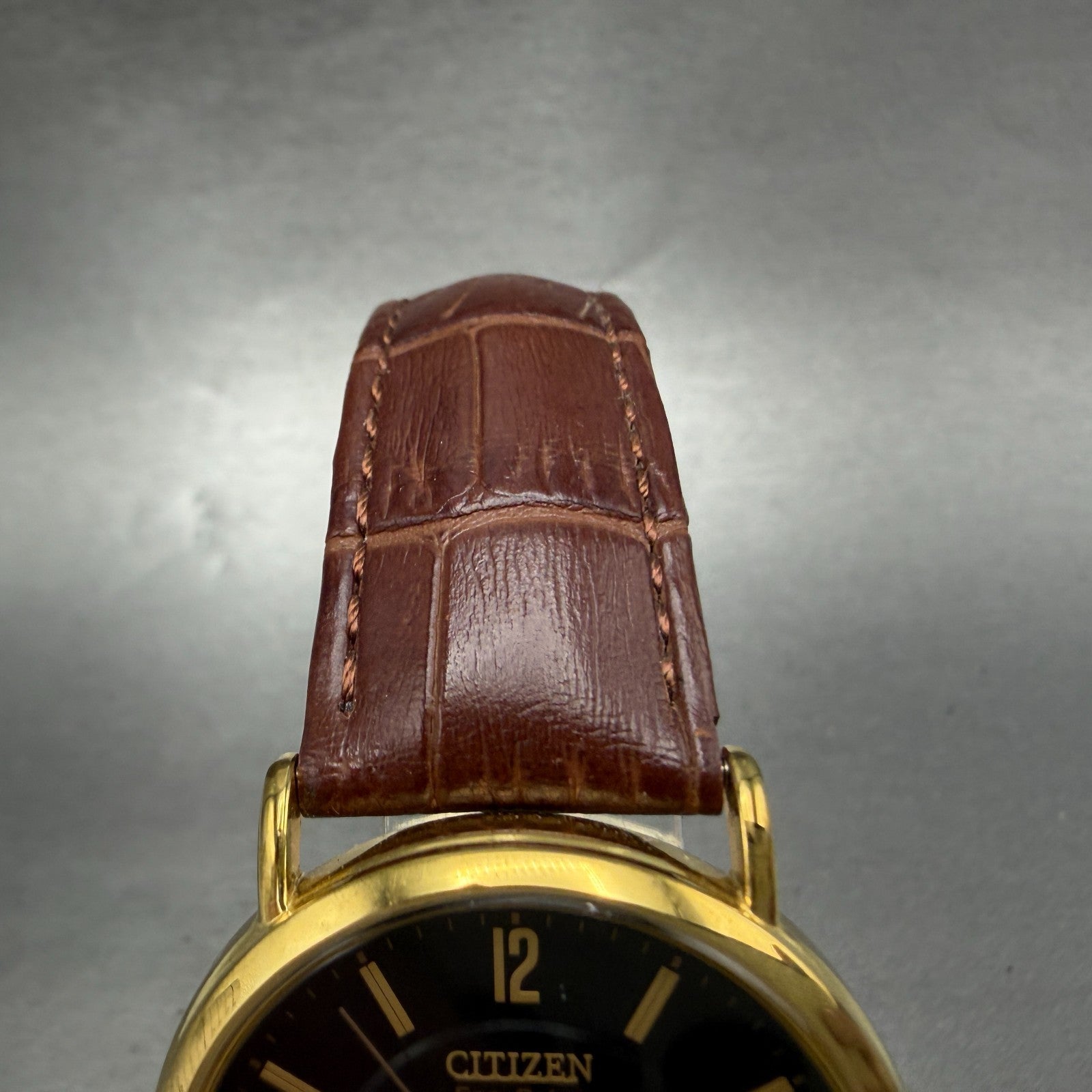 Citizen Eco-Drive Watch Men 36mm Black Dial Gold Tone Daydate E101-S015588 Runs4