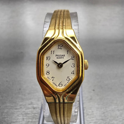 Seiko Pulsar Watch Women 16mm White Dial Gold Tone Oval V810-6370 New Battery0