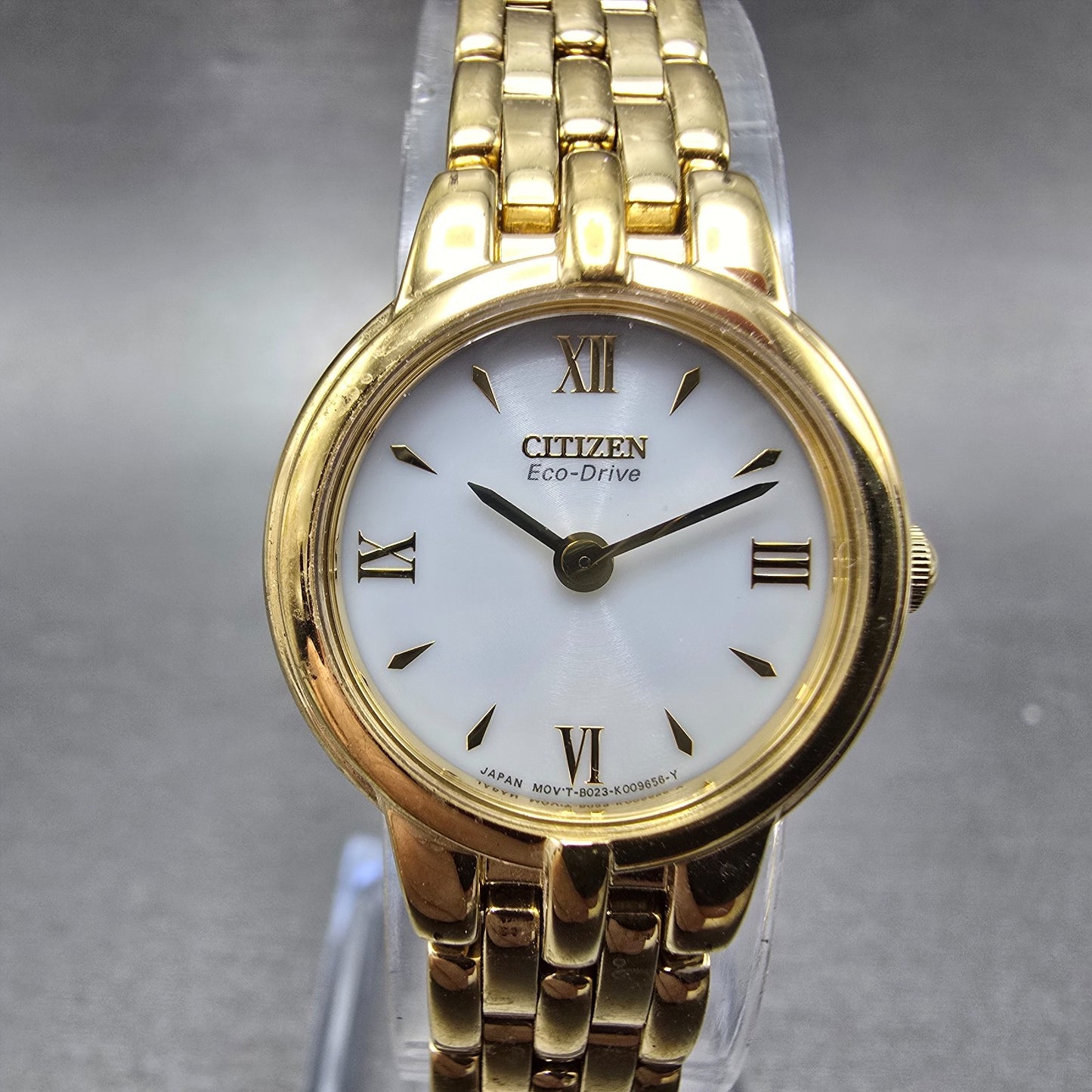 Citizen Eco-Drive Watch Women 21mm White Dial Gold Tone Round B023-K006589 Runs0