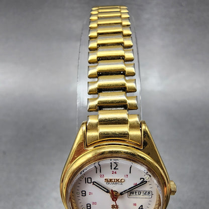 Seiko SQ Watch Women 24mm White Dial Gold Tone Daydate Round 7N83-6A09 New Batt