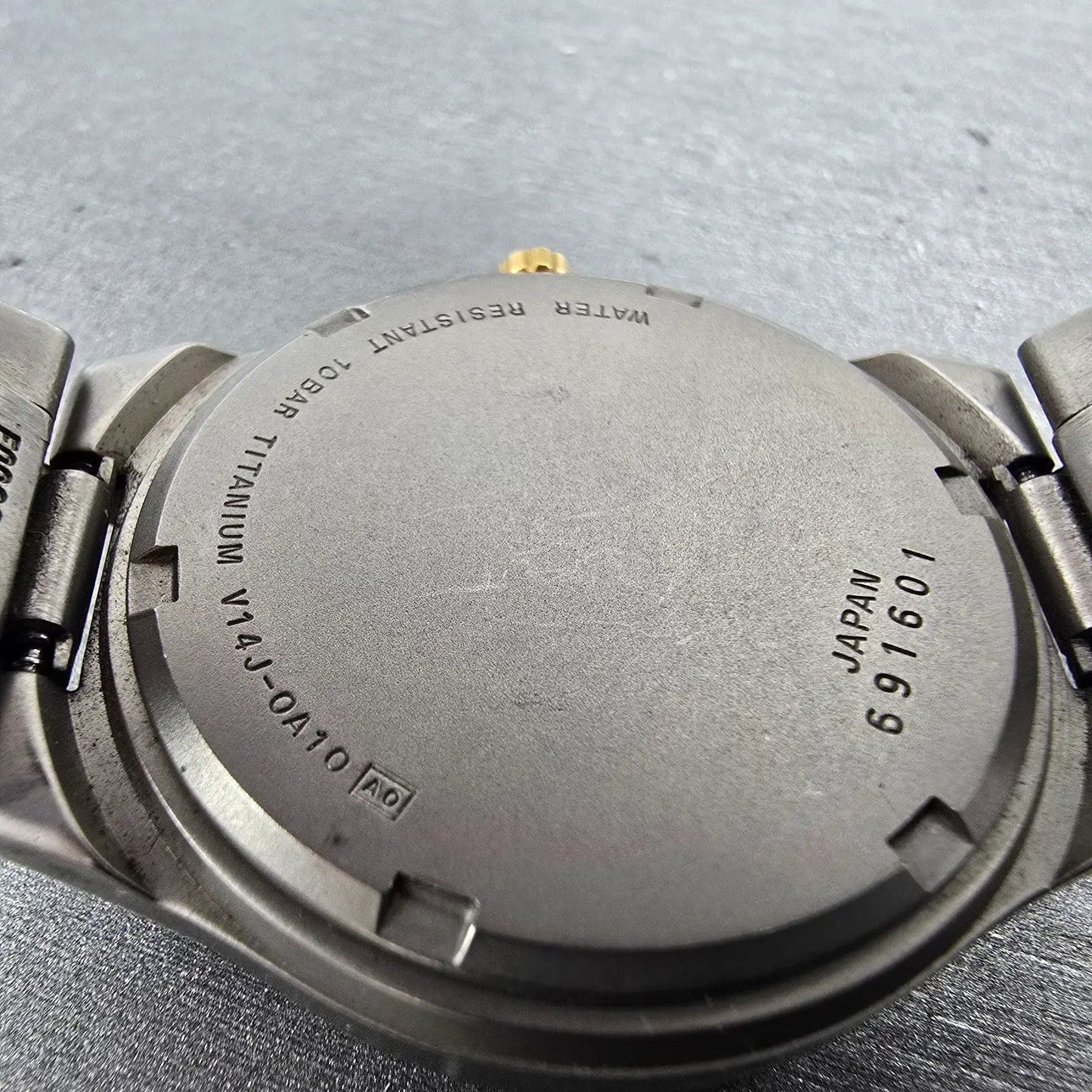 Seiko Alba Epsilon Watch Men 36mm Gray Dial Titanium Daydate V14J-0A10 Runs9