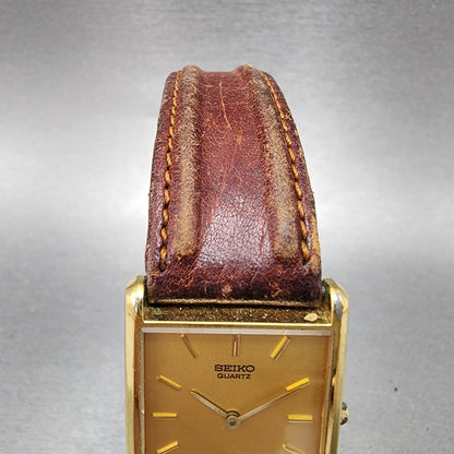Seiko Tank Watch Men 25mm Gold Dial Gold Tone Rectangle 7N00-5B29 New Battery