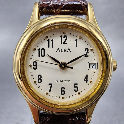 Seiko Alba Watch Women 23mm White Dial Gold Tone Date V782X104 New Battery1