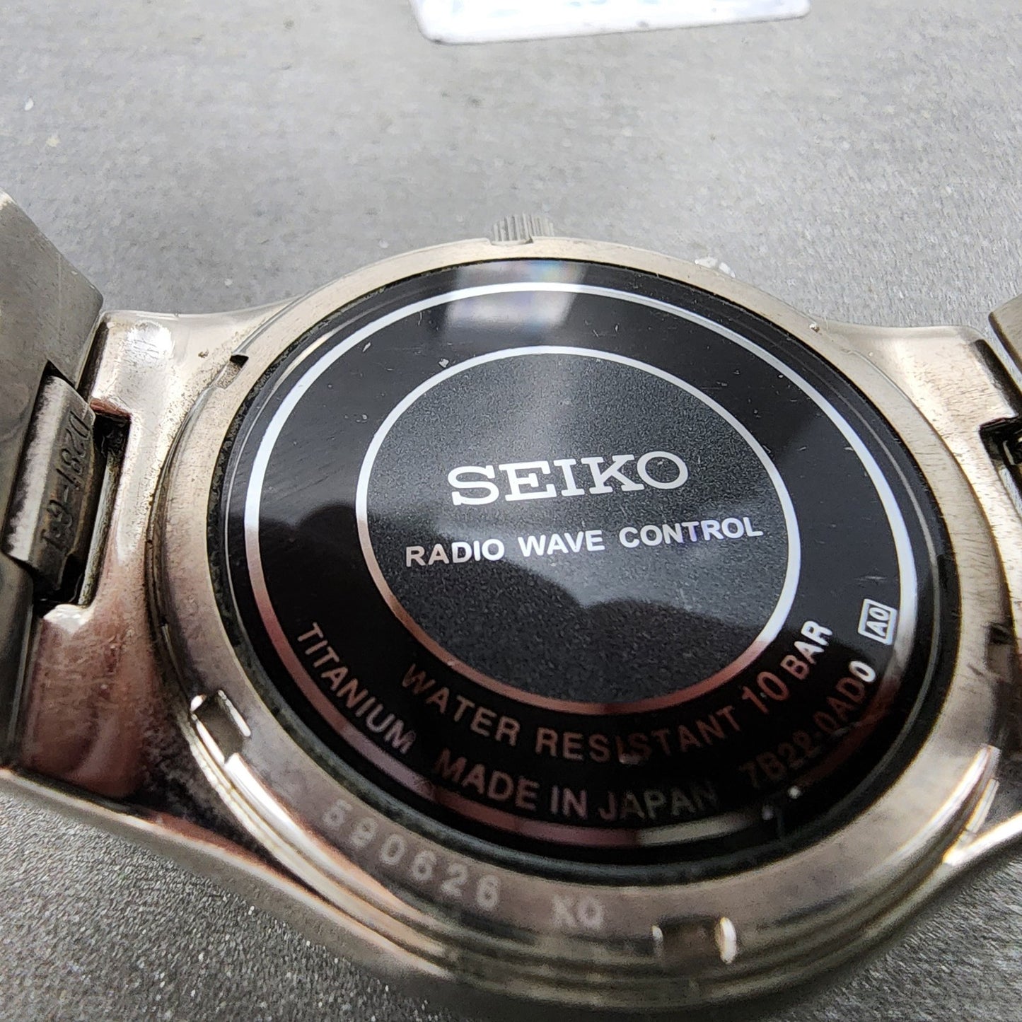 Seiko Solar Watch Men 38mm Silver Dial Titanium Atomic Date Round Runs 7B220AD010