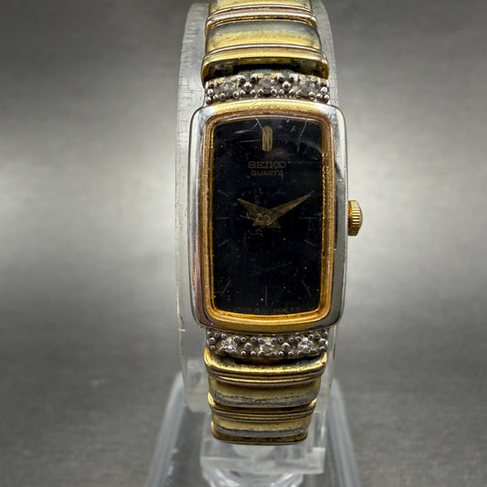 Seiko Tank Watch Women 13mm Black Dial Gold Tone Rectangle 2E20-6929 New Battery0