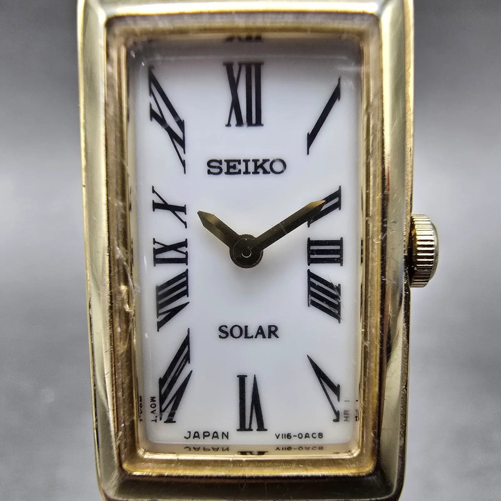 Seiko Solar Tank Watch Women 15mm White Dial Gold Tone Rectangle V116-0AA0 Works1