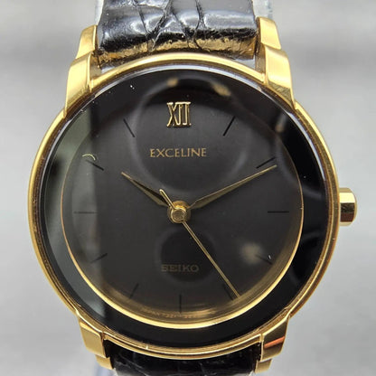 Seiko Exceline Watch Women 22mm Black Dial Gold Tone Round 7321-0770 New Battery1