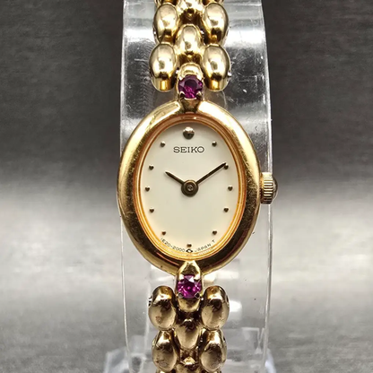 Seiko Watch Women 13mm Ivory Dial Gold Tone Gemmed Oval 1E20-6140 New Battery0