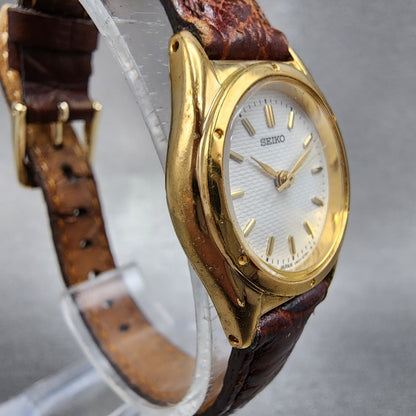 Seiko Watch Women 23mm White Dial Gold Tone Round V4011920 New Battery VTG3