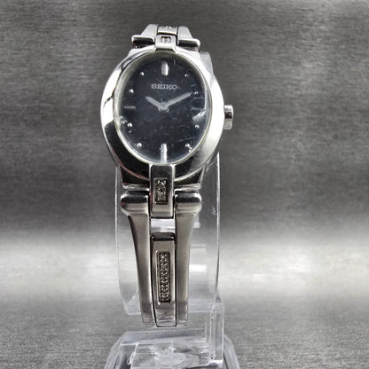 Seiko Watch Women 17mm Black Dial Silver Tone Oval 1N00-0KG0 New Battery5