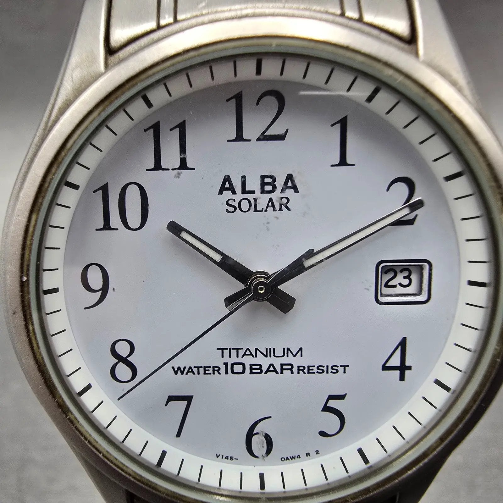 Seiko Alba Solar Watch Men 34mm White Dial Titanium Date V145-0AM0 Runs1
