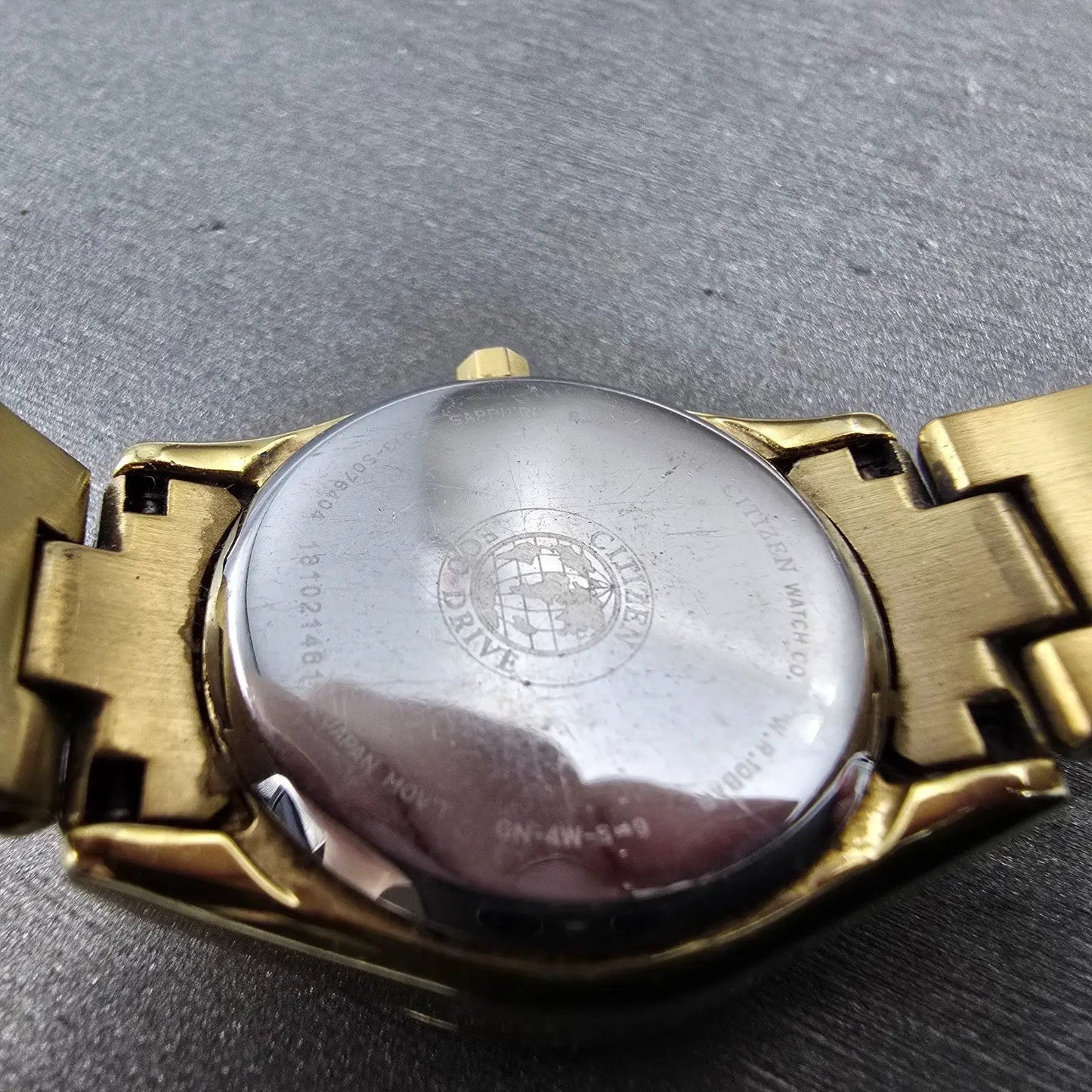 Citizen Eco-Drive Watch Women 26mm MOP Dial Gold Tone Date E013-S076404 Runs9