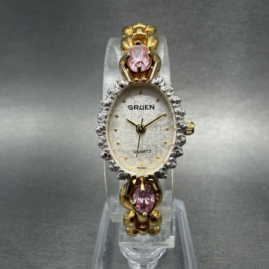 Gruen Watch Women 18mm White Dial Gold Tone Oval Pink Gem Stones New Battery0
