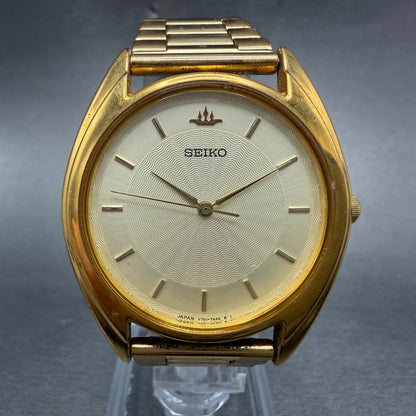 Seiko Watch Men 35mm Champagne Dial Gold Tone Round VTG V701-7A10 New Battery0