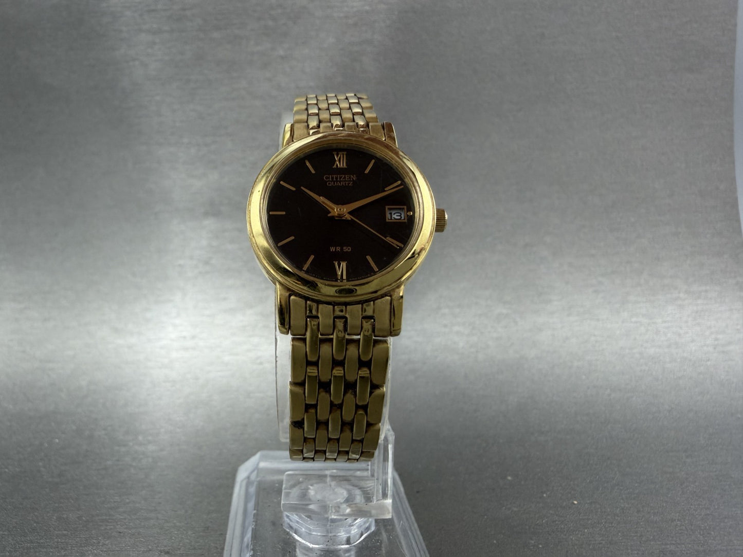 Citizen Watch Women 24mm Black Dial Gold Tone Date Round 1012S038562 New Batt8