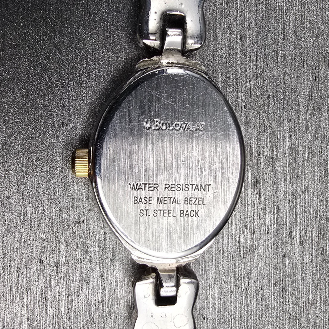 Bulova Watch Women 17mm White Dial Two Tone Oval 98L66 New Battery Vintage AB10