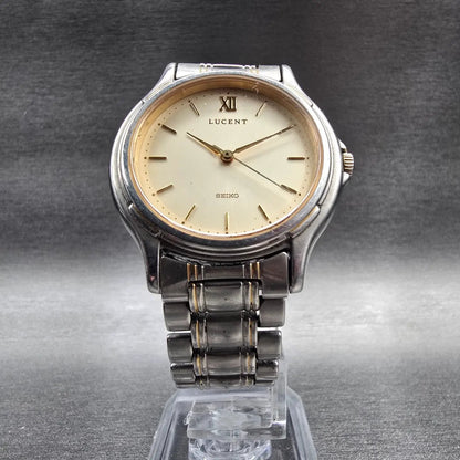 Seiko Lucent Watch Men 32mm Champagne Dial Silver Round 5E21-6B00 New Batt JDM5